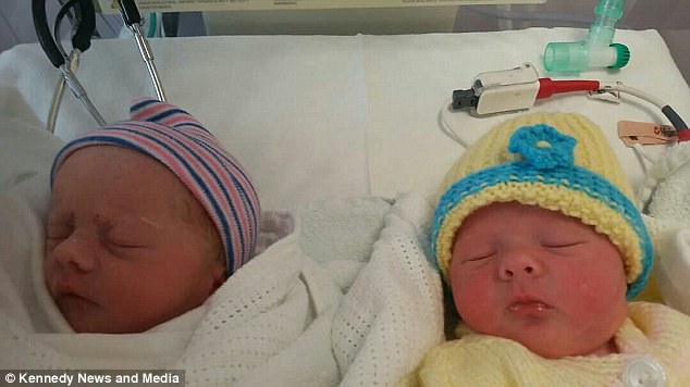 Willow and Freya seen  soon after birth in the birth ward dressed in cute colourful hats